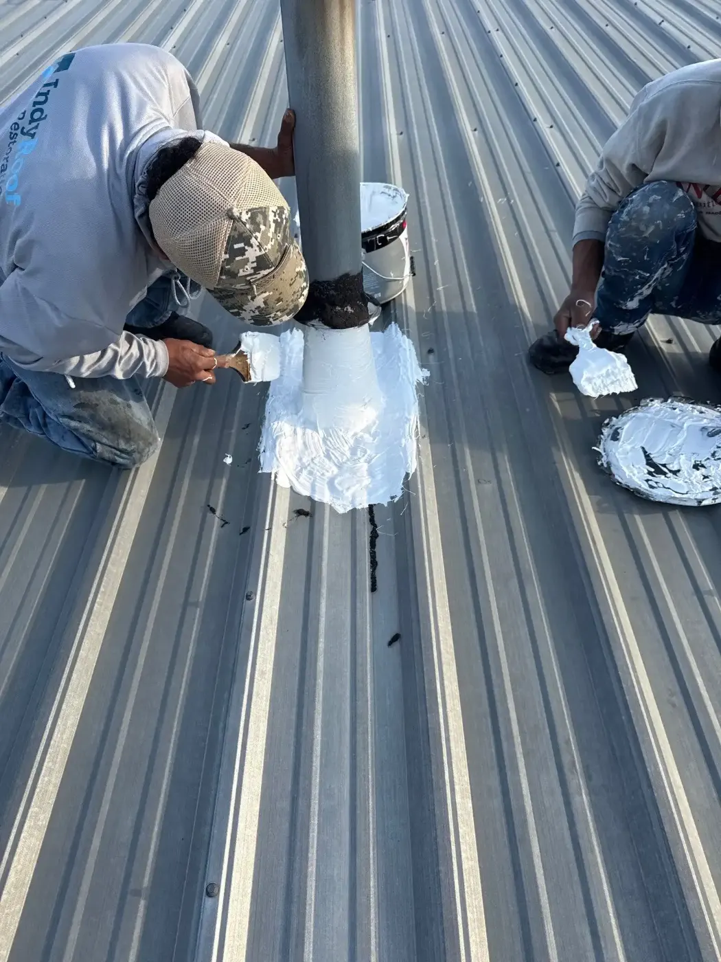 Tarping and dry-in on a Corydon commercial roof